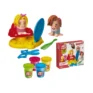 An array of colorful clays and hairstyling tools from the klei kappersset spread out on a table.
